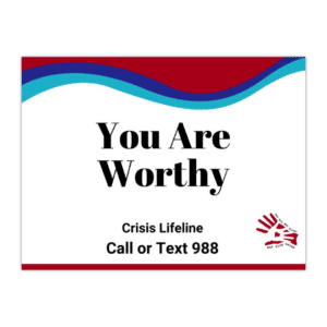 Sign says, “You are Worthy" along with the crisis lifeline that says, "Call or text 988" with the suicide prevention awareness colors and the Our City Cares Logo at the bottom.